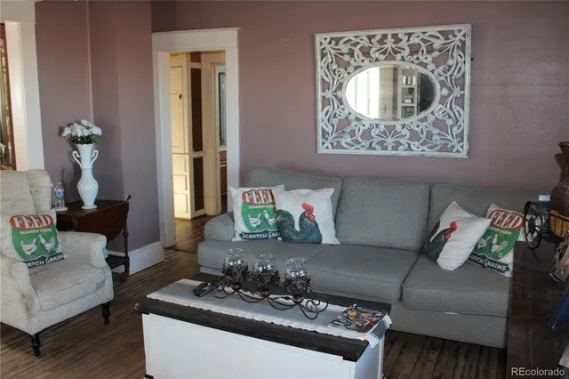 a bedroom with a bed and a table in it