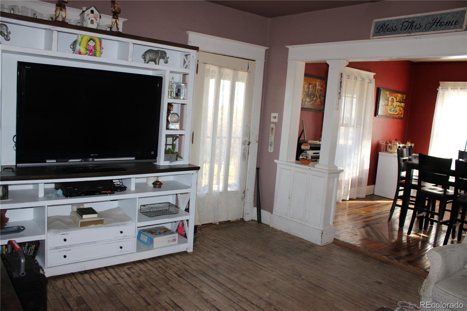 1901 County Road East Joes, CO 80822 - Photo 32 of 42 a living room with furniture and a flat screen tv