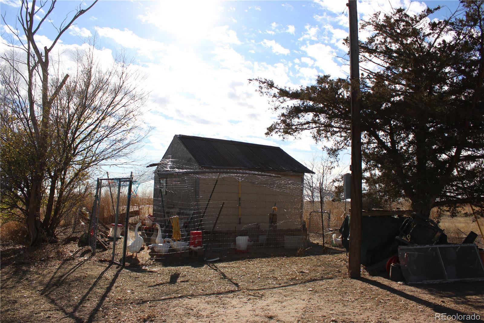 1901 County Road East Joes, CO 80822 - Photo 9 of 42 a front view of a house