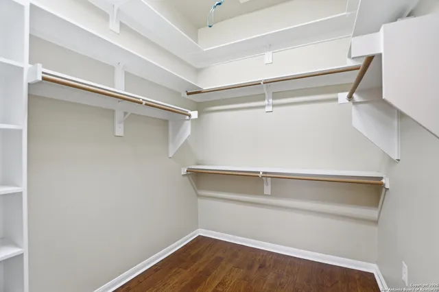 a view of an empty walk in closet