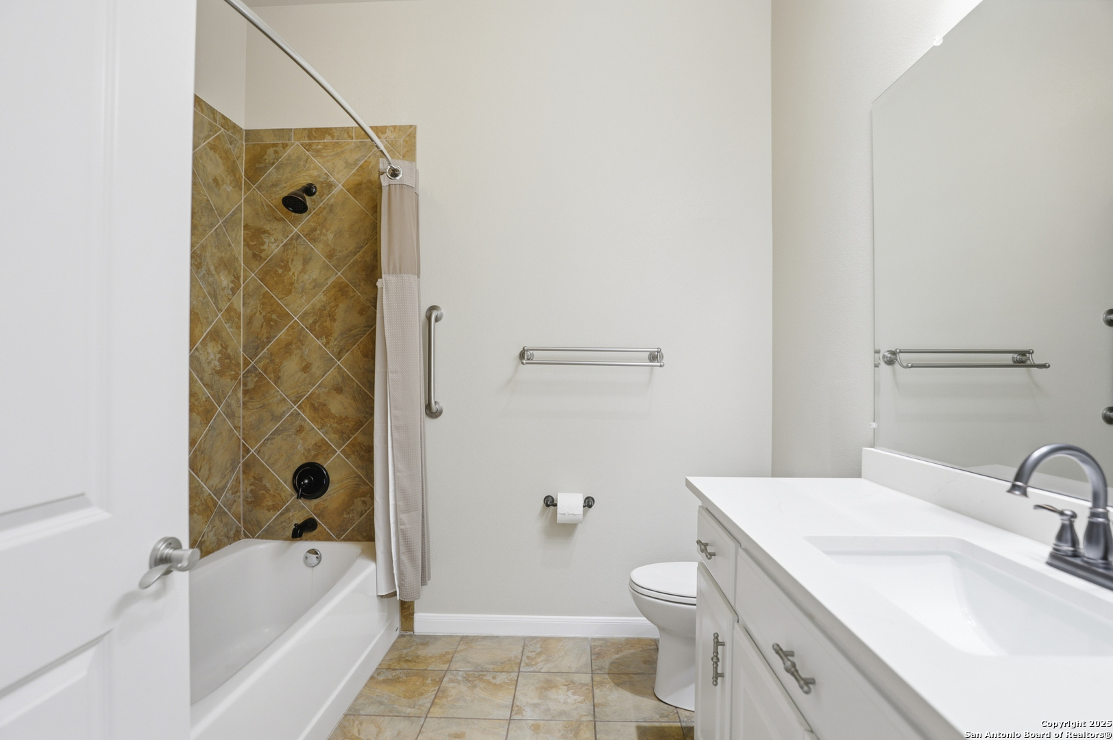 7800 Sw Parkway, Unit 1710 Austin, TX 78735 - Photo 24 of 34 a bathroom with a granite countertop sink a toilet and shower
