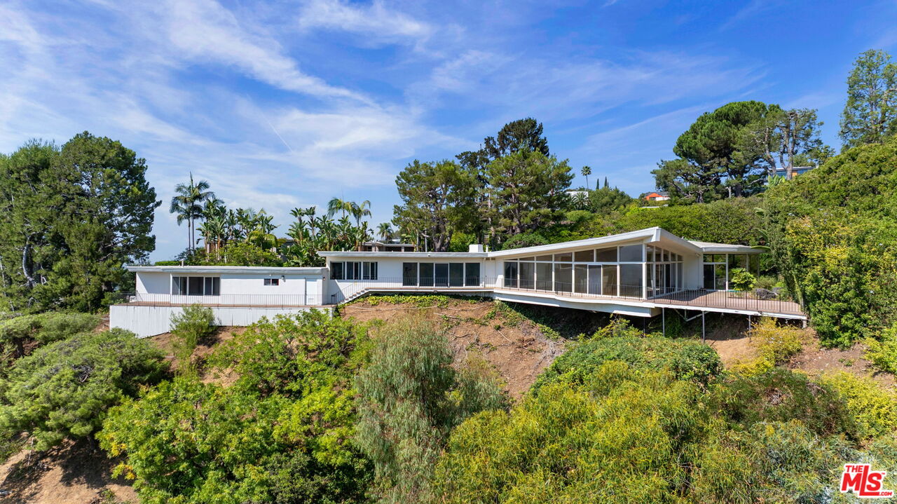 a house view with a garden space