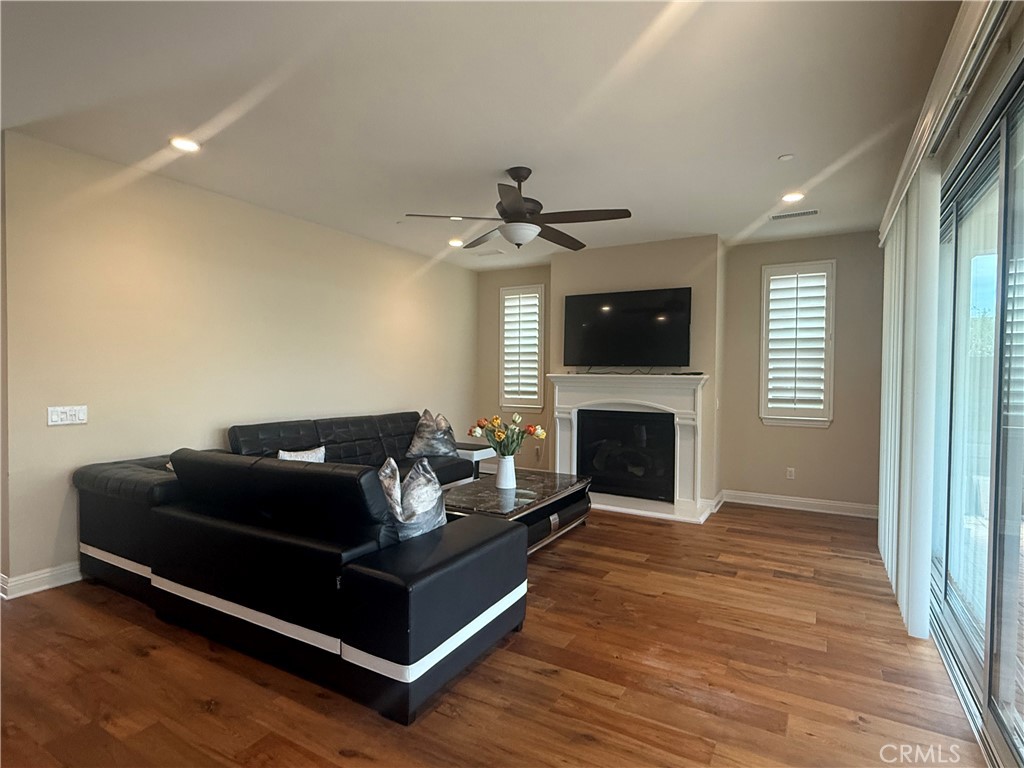 109 Sideways Irvine, CA 92618 - Photo 3 of 12 a living room with furniture and a fireplace