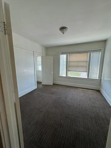 a backyard of a house with seating space