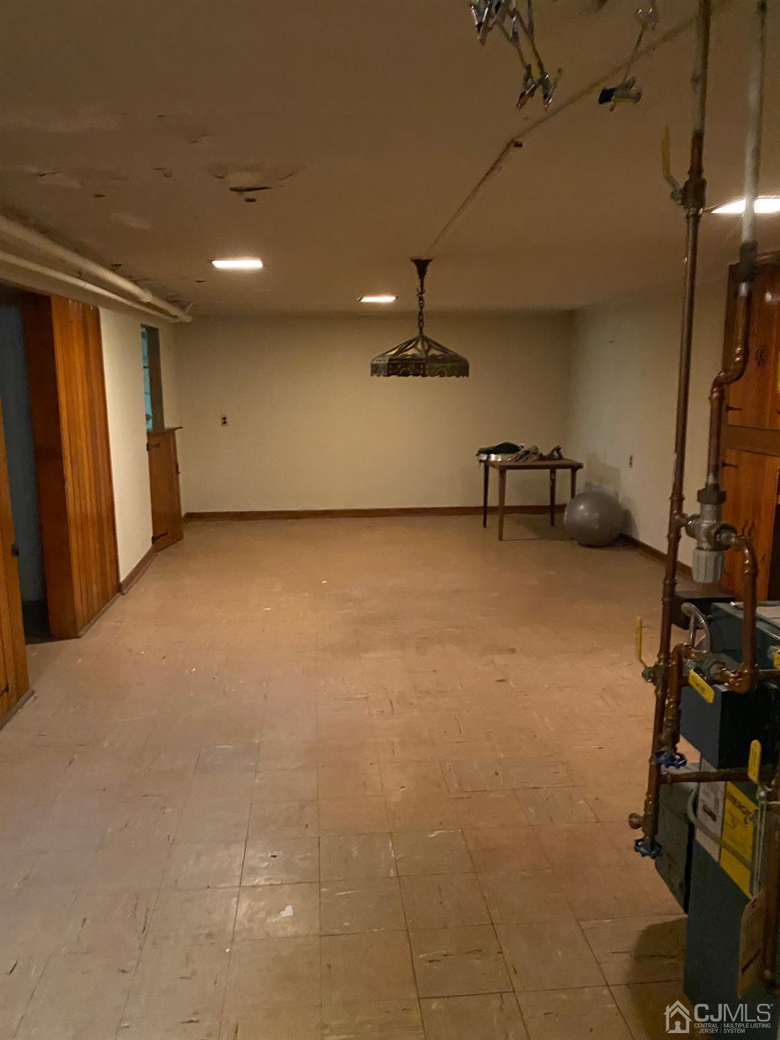 604 Mountain View Terrace Middlesex, NJ 08846 - Photo 5 of 6 a view of a room with gym equipment