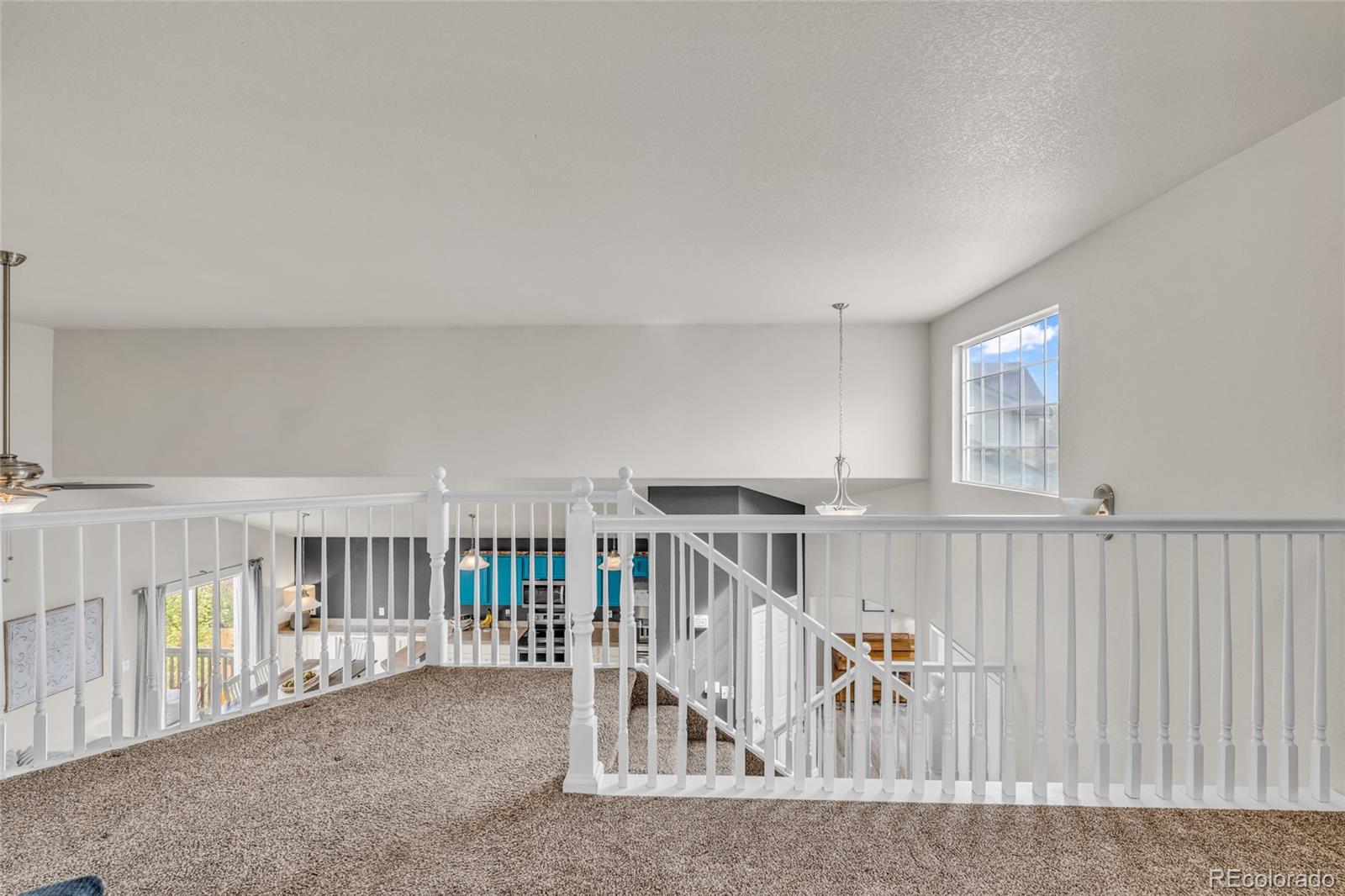6132 Graden Street Frederick, CO 80530 - Photo 18 of 28 a view of entryway with livingroom