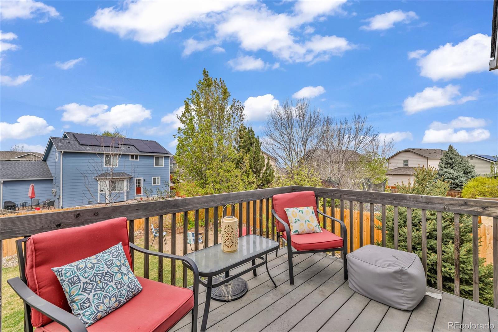 6132 Graden Street Frederick, CO 80530 - Photo 28 of 28 a view of a chairs on a deck