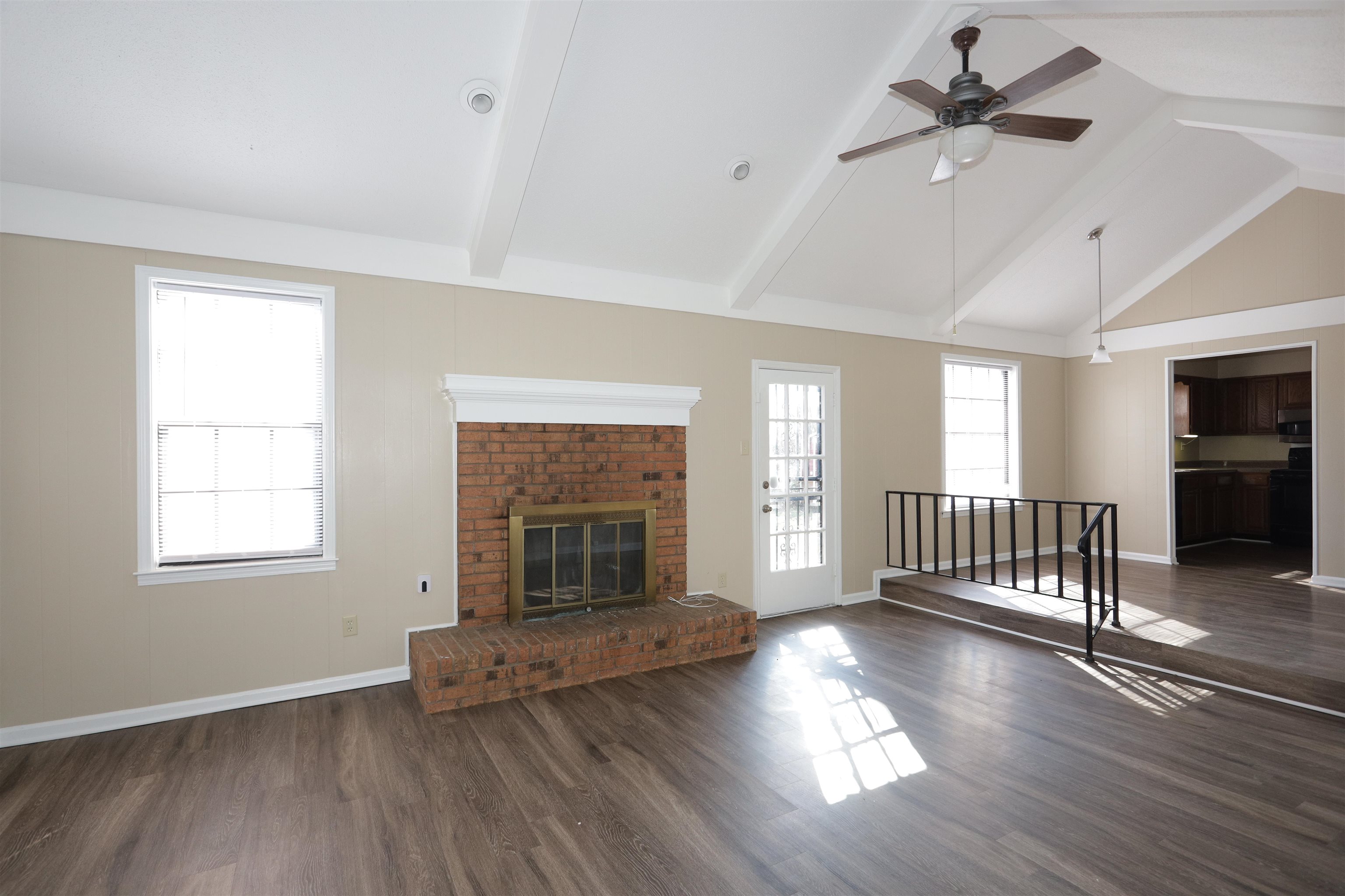 3164 Raleigh Ridge Drive Memphis, TN 38128 - Photo 5 of 15 a view of empty room with fireplace and wooden floor
