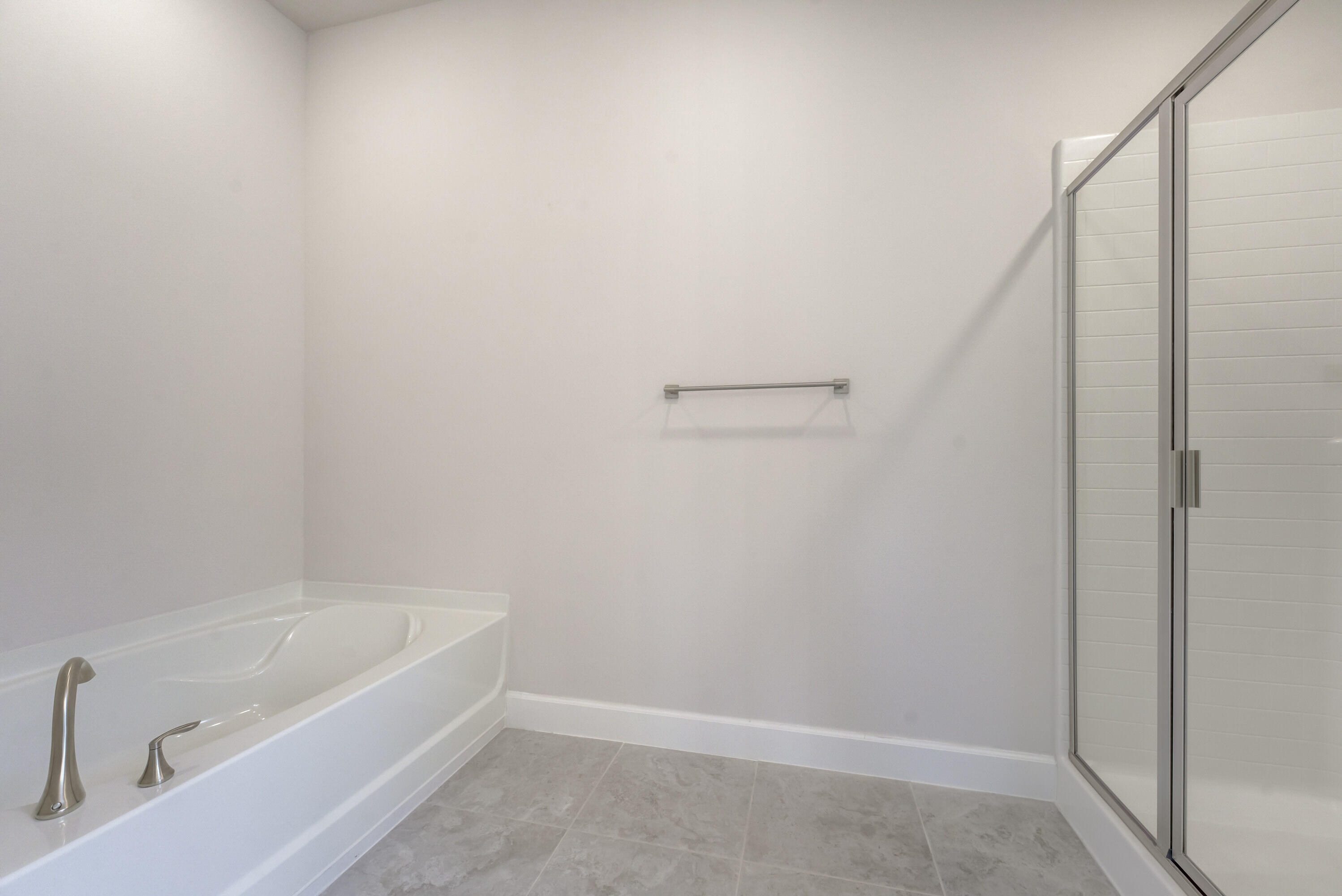 5327 Vespera Street Fort Pierce, FL 34951 - Photo 15 of 27 a bathroom with a bathtub