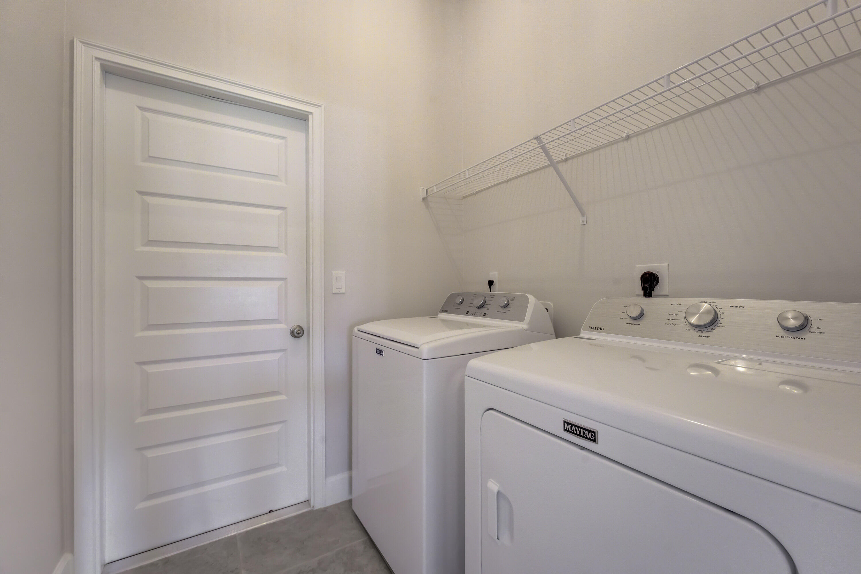 5327 Vespera Street Fort Pierce, FL 34951 - Photo 21 of 27 a utility room with dryer and washer