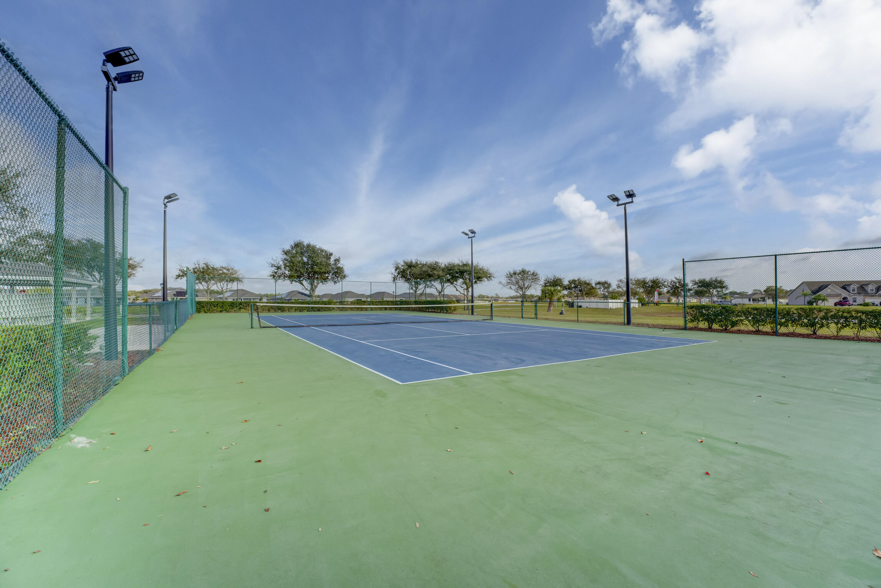 5327 Vespera Street Fort Pierce, FL 34951 - Photo 25 of 27 a view of a green field