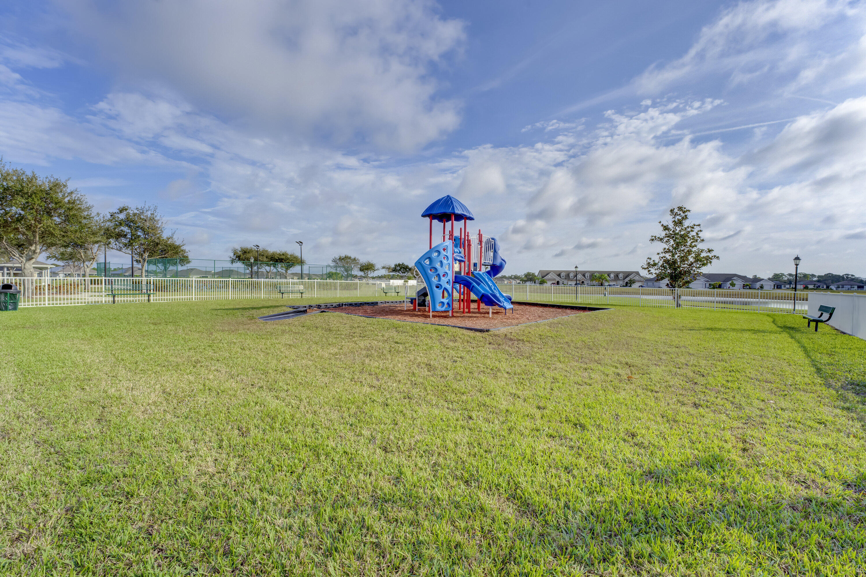 5327 Vespera Street Fort Pierce, FL 34951 - Photo 26 of 27 a view of a playground with basketball court