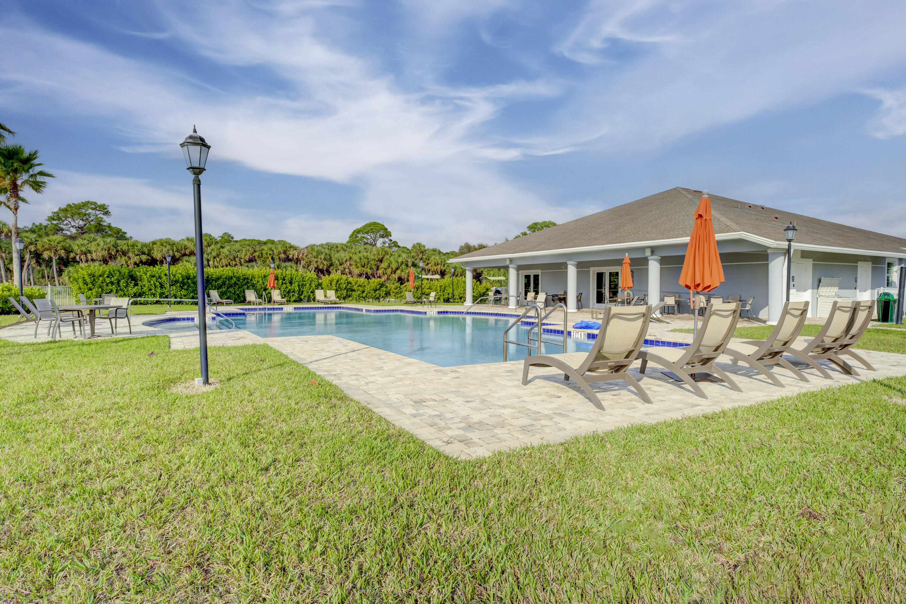 5327 Vespera Street Fort Pierce, FL 34951 - Photo 27 of 27 a view of a house with swimming pool and porch