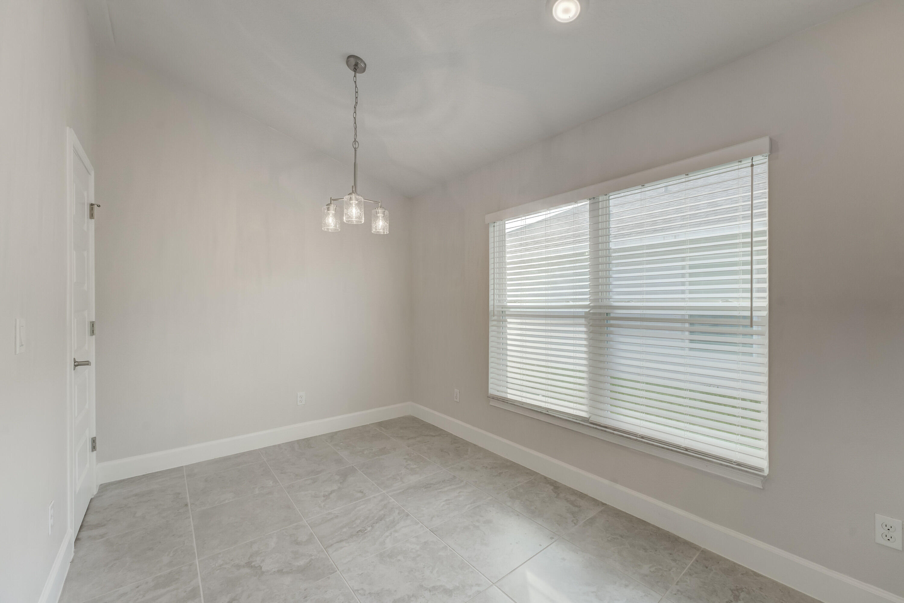 5327 Vespera Street Fort Pierce, FL 34951 - Photo 10 of 27 a view of a room that has a window in it