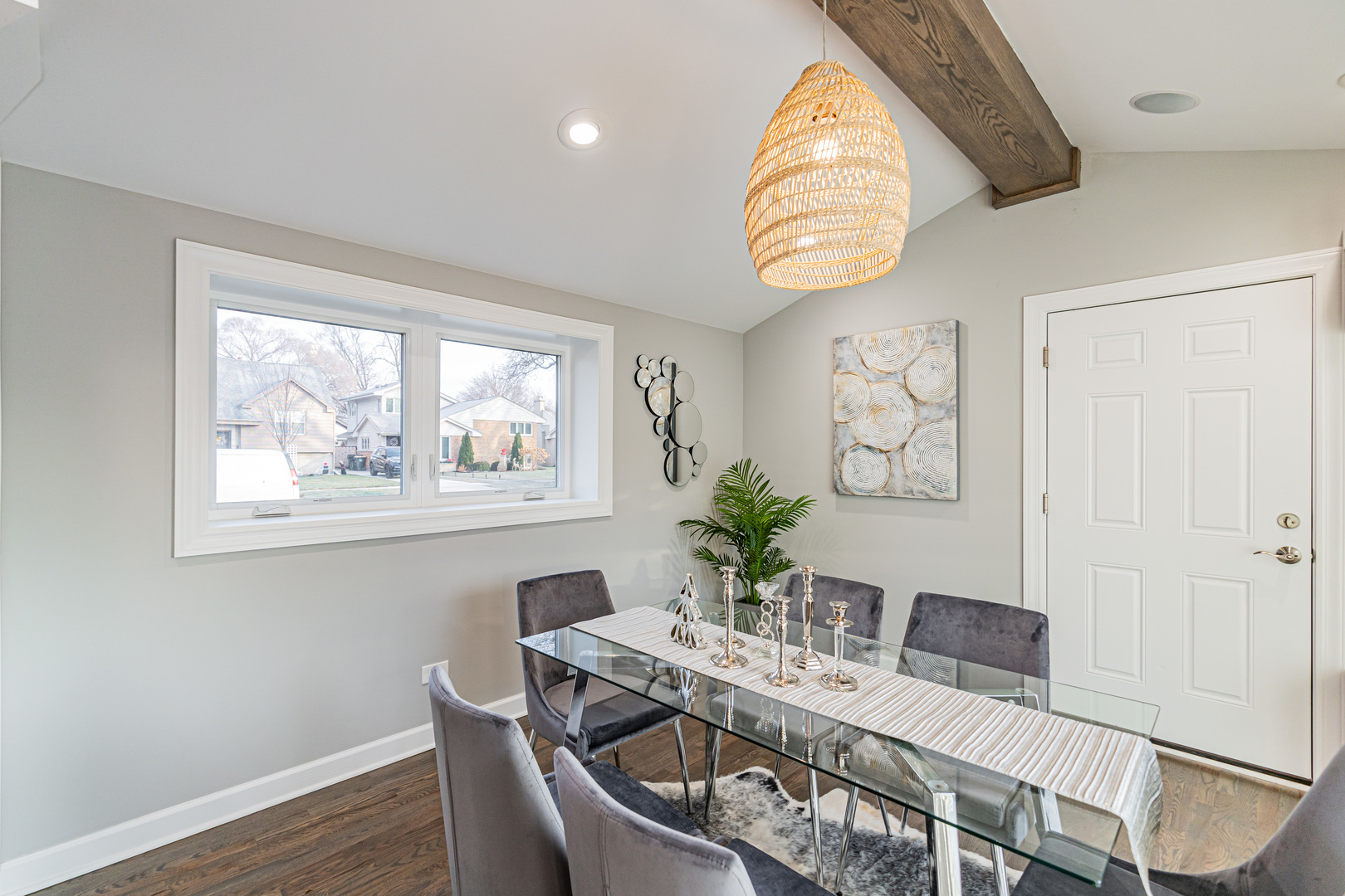1621 South Grace Avenue Park Ridge, IL 60068 - Photo 13 of 29 a dining room with furniture a potted plant and wooden floor