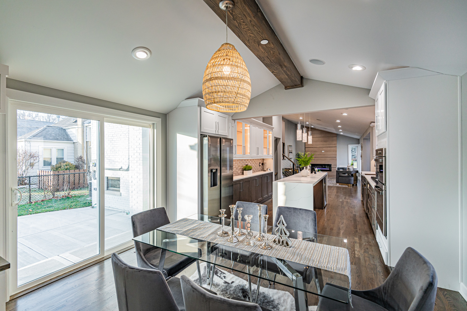 1621 South Grace Avenue Park Ridge, IL 60068 - Photo 15 of 29 a dining room with furniture a chandelier and wooden floor