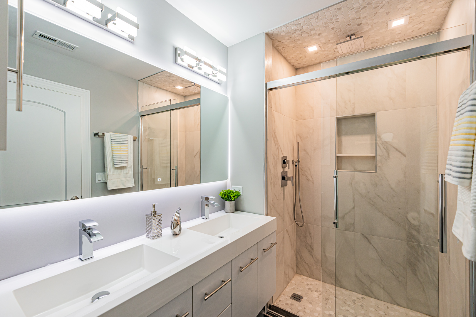 1621 South Grace Avenue Park Ridge, IL 60068 - Photo 24 of 29 a bathroom with a double vanity sink mirror and shower
