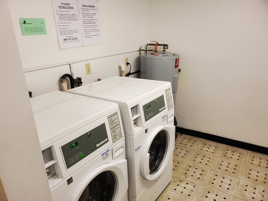 33 Brainerd Road, Unit 112 Boston, MA 02134 - Photo 22 of 23 a utility room with dryer and washer