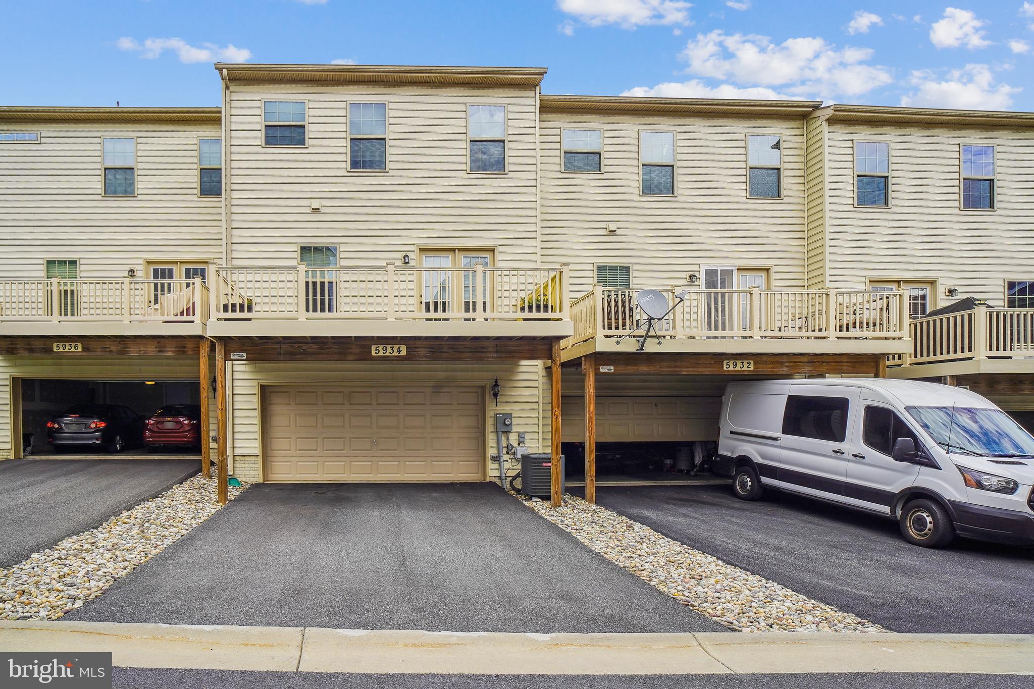 5934 Jefferson Commons Way Frederick, MD 21703 - Photo 8 of 27 a view of a car park in front of house