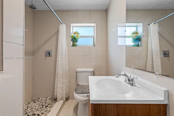 a bathroom with a sink and a toilet