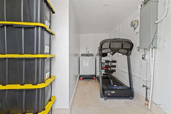 a view of a room with gym equipment