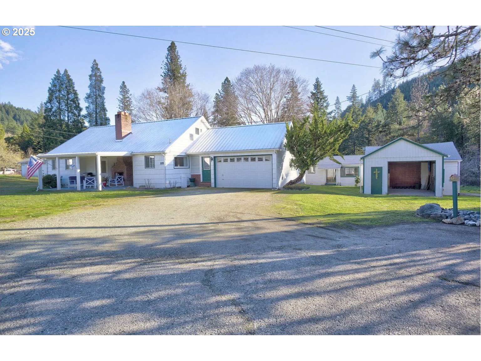 a view of a house with a big yard