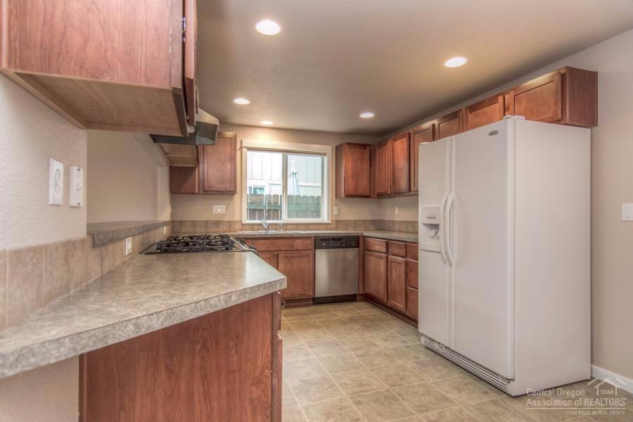 20872 Daniel Duke Way Bend, OR 97701 - Photo 13 of 21 Note the extensive cherry cabinetry and