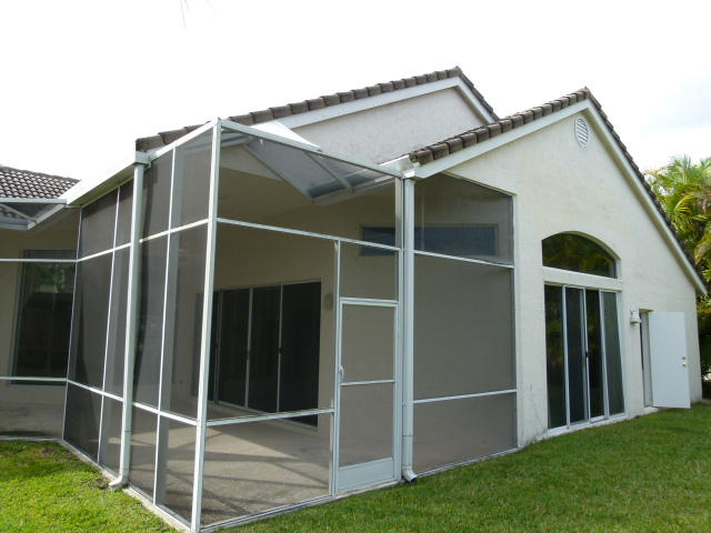 7901 Dorchester Road Boynton Beach, FL 33472 - Photo 11 of 14 a view of outdoor space and yard