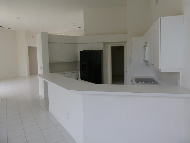 7901 Dorchester Road Boynton Beach, FL 33472 - Photo 3 of 14 a view of a living room with furniture