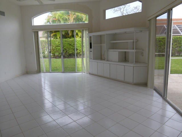 7901 Dorchester Road Boynton Beach, FL 33472 - Photo 6 of 14 en empty room with windows