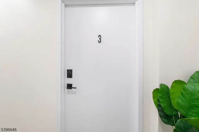 a picture of a bathroom with a shower