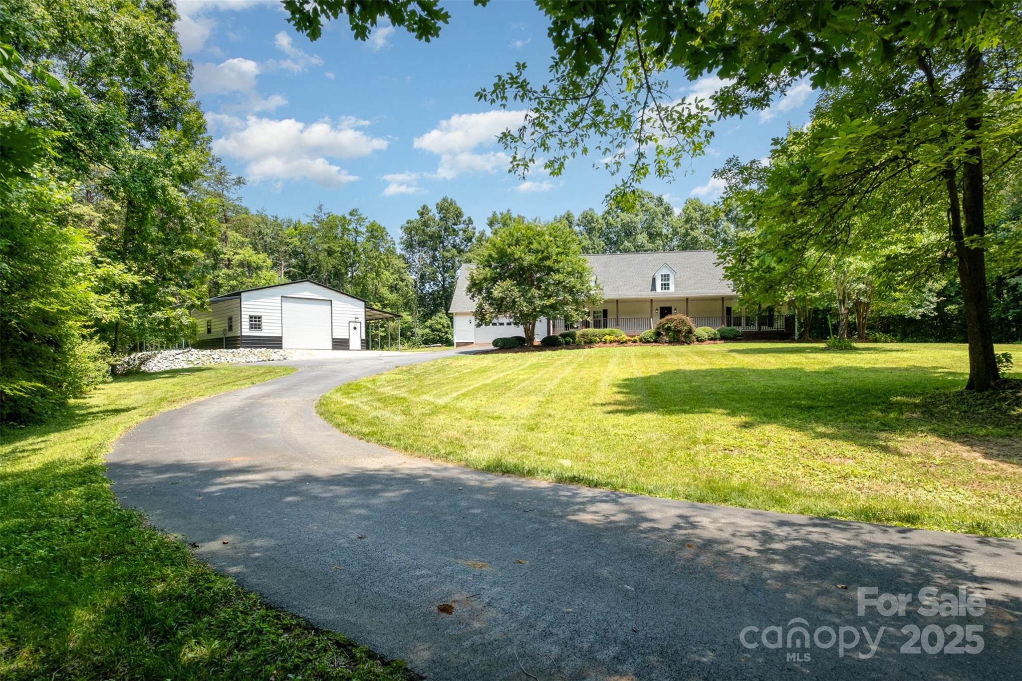 6811 Kluttz Road Concord, NC 28025 - Photo 4 of 38 a view of a house with swimming pool and a yard