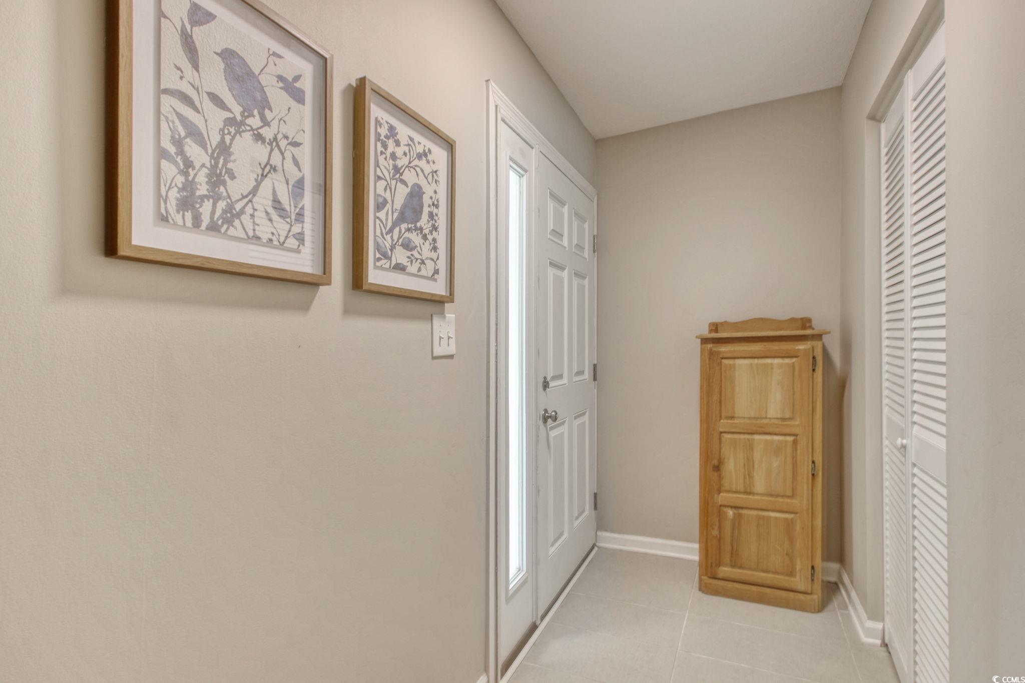 3931 Pinebrook Circle Little River, SC 29566 - Photo 16 of 32 Side entrance foyer