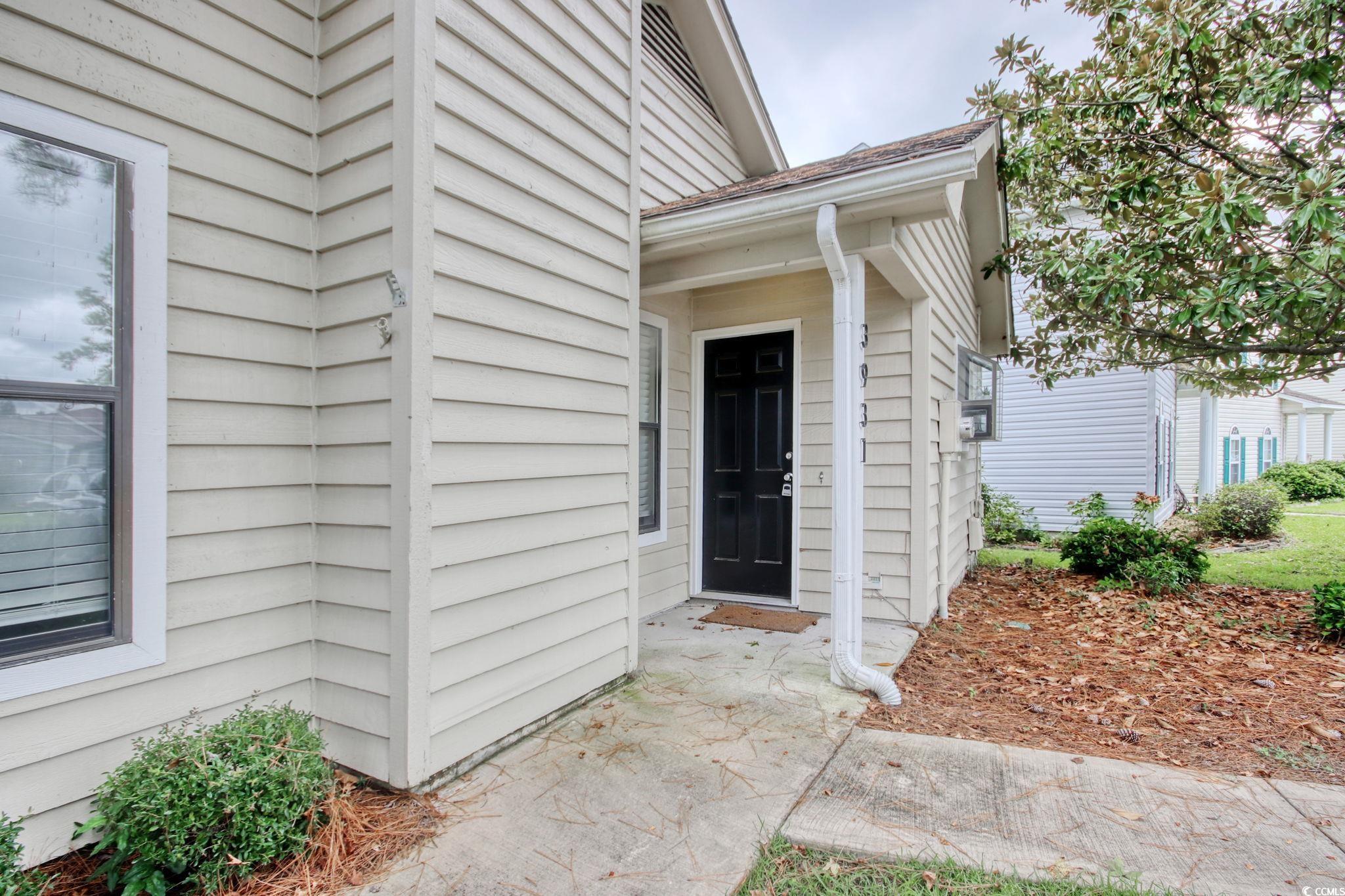 3931 Pinebrook Circle Little River, SC 29566 - Photo 4 of 32 Front doorway to property