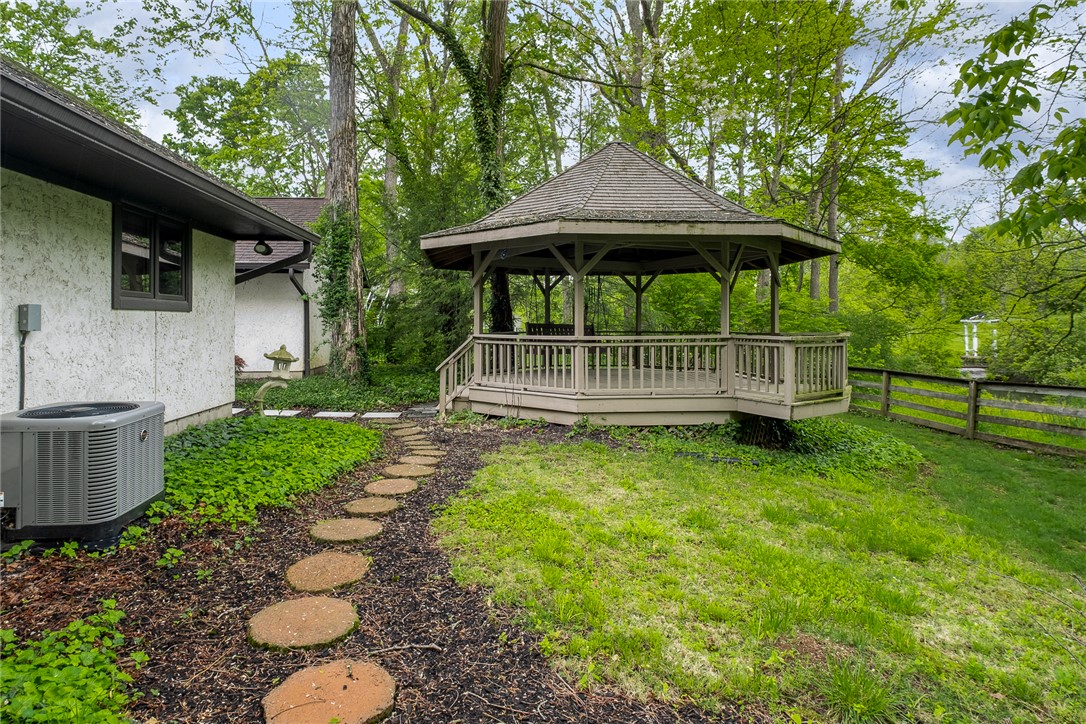 273 North Alpha Bellbrook Road Dayton, OH 45434 - Photo 41 of 43 This serene outdoor space features a charming gazebo, perfect for relaxation and enjoying nature's beauty.