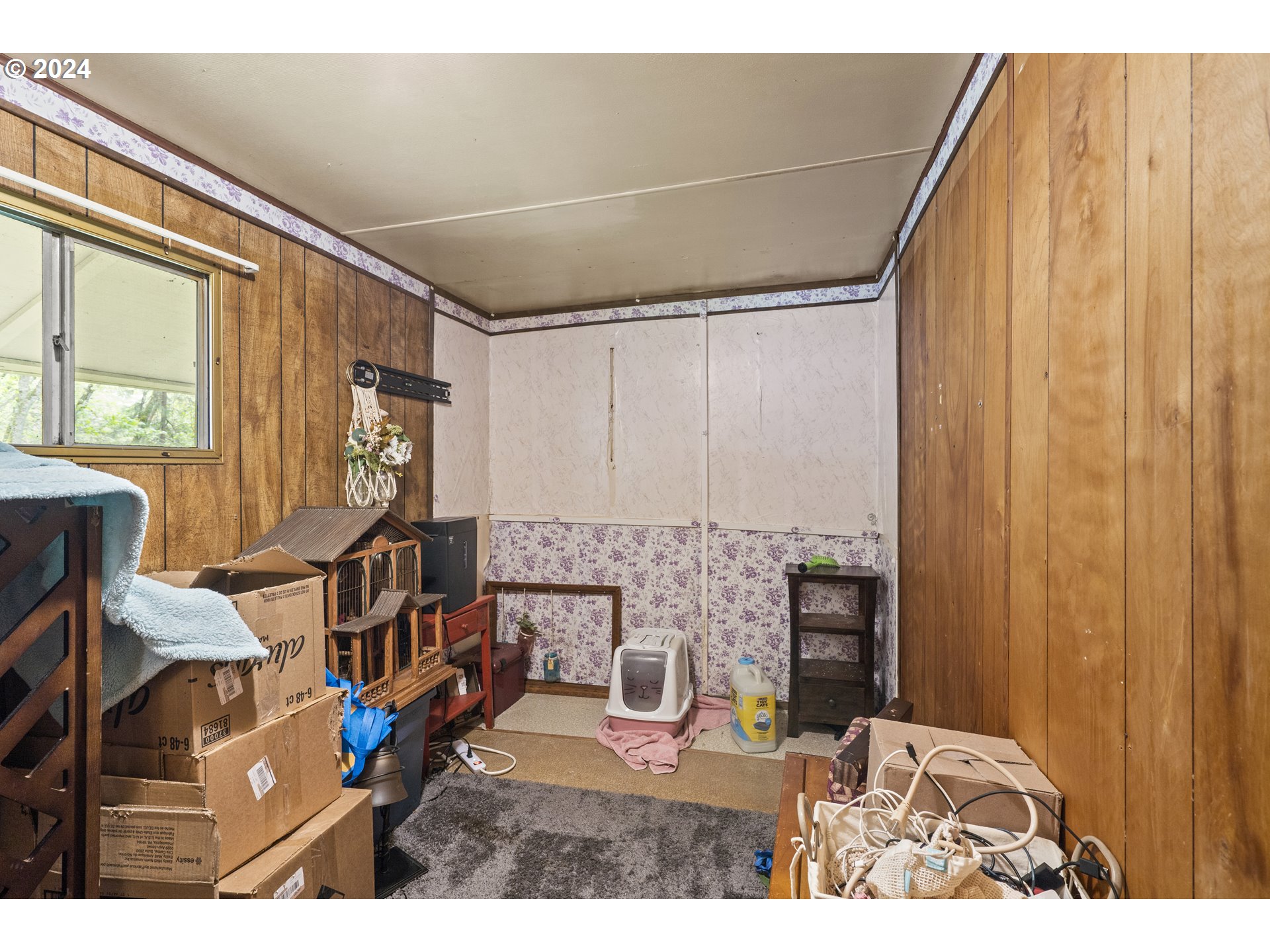 403 Azalea Drive Grants Pass, OR 97526 - Photo 9 of 17 a view of a bedroom with furniture and windows