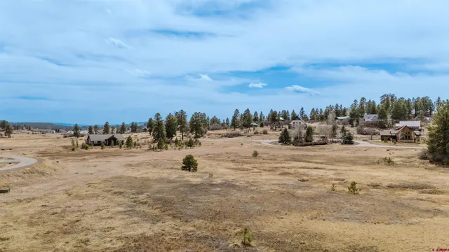 a view of a city street with a building