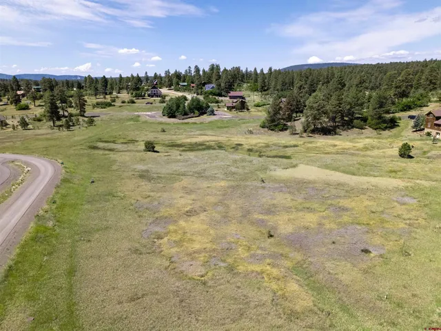 a view of a yard with an outdoor space