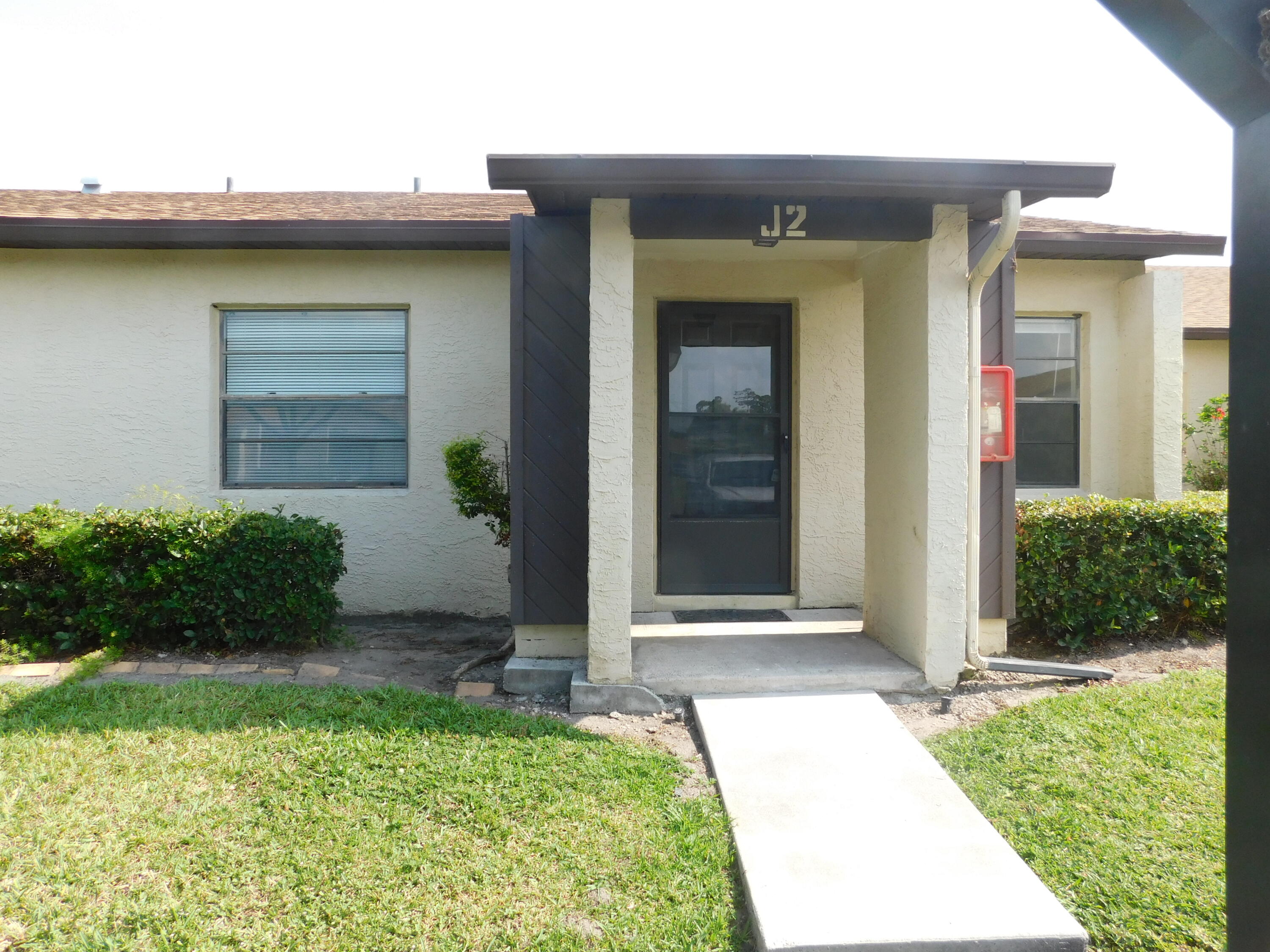 6016 Indrio Road, Unit 2 Fort Pierce, FL 34951 - Photo 1 of 29 Front