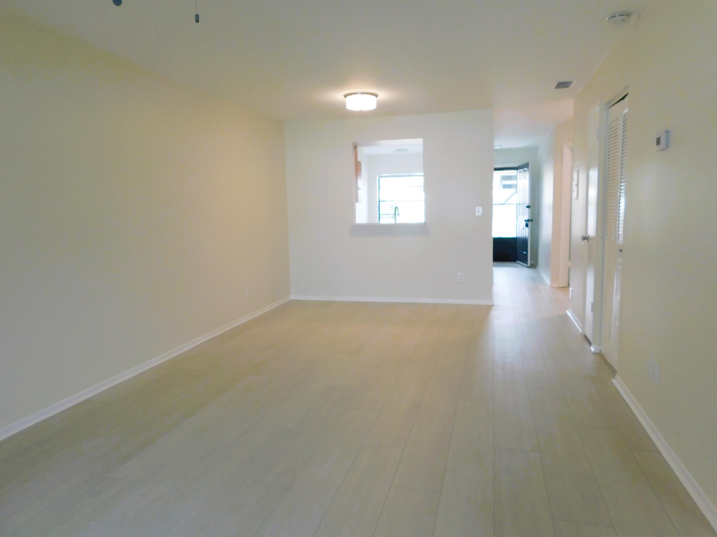 6016 Indrio Road, Unit 2 Fort Pierce, FL 34951 - Photo 2 of 29 Living Room