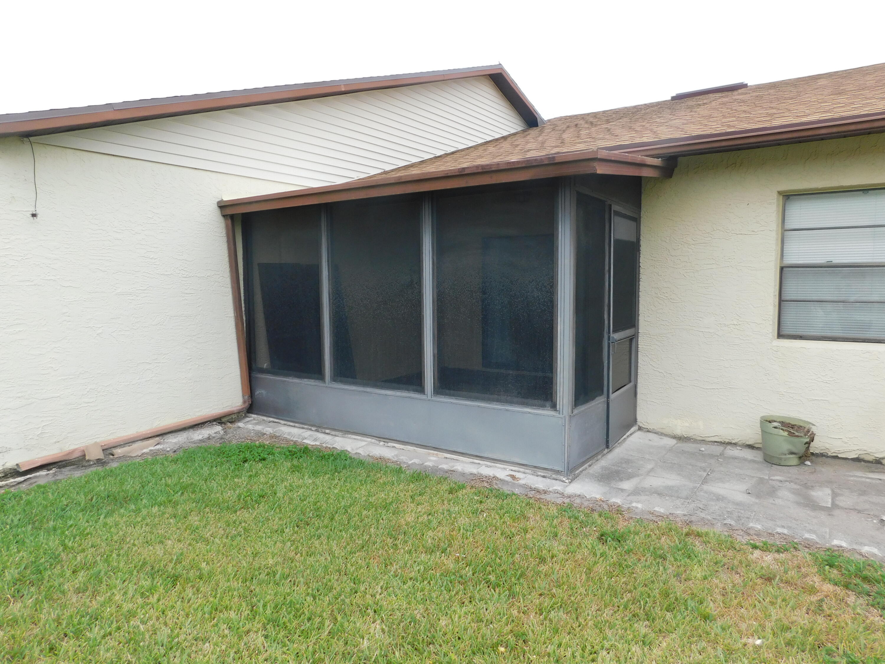 6016 Indrio Road, Unit 2 Fort Pierce, FL 34951 - Photo 21 of 29 Exterior porch
