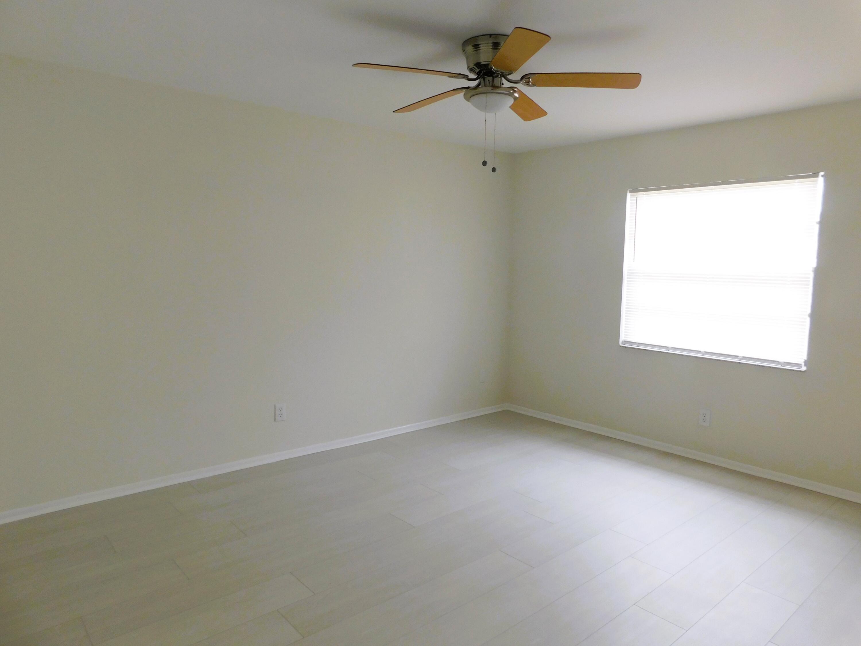 6016 Indrio Road, Unit 2 Fort Pierce, FL 34951 - Photo 6 of 29 Master bedroom