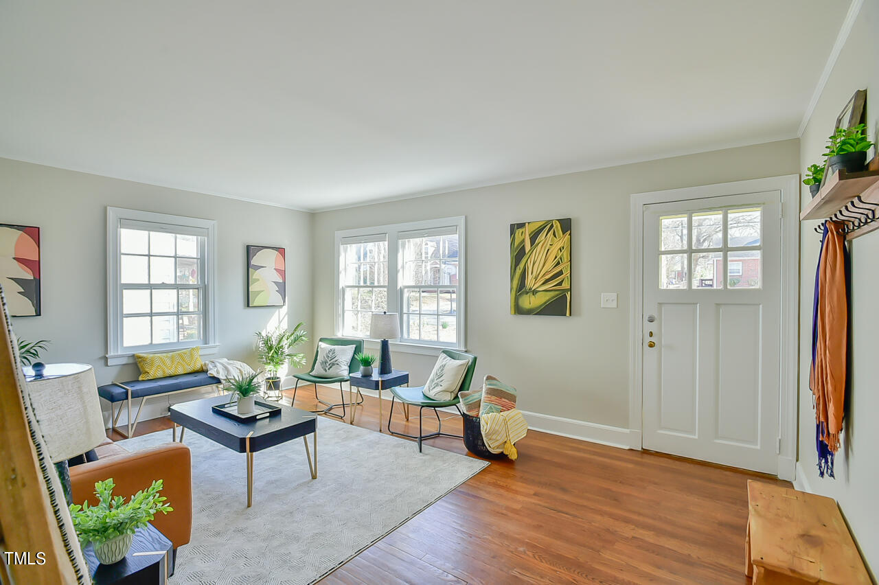 2411 Farthing Street Durham, NC 27704 - Photo 12 of 47 a living room with furniture and wooden floor