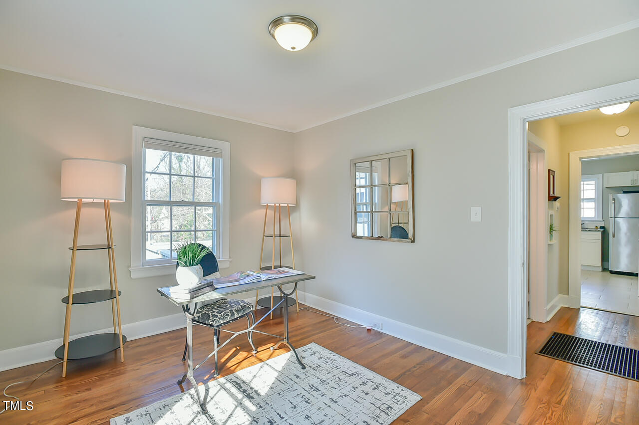 2411 Farthing Street Durham, NC 27704 - Photo 22 of 47 a work room with furniture and wooden floor