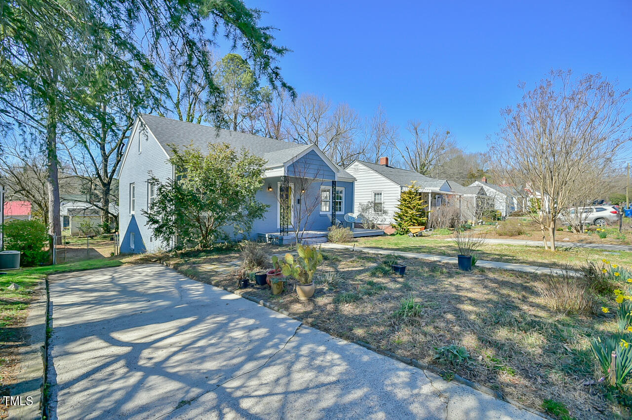 2411 Farthing Street Durham, NC 27704 - Photo 3 of 47 a view of yard with tree in front of it
