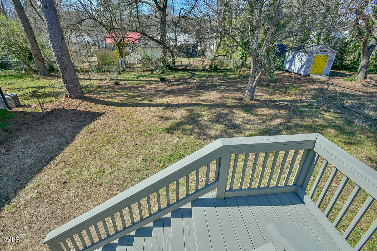 2411 Farthing Street Durham, NC 27704 - Photo 34 of 47 a view of a yard with large trees