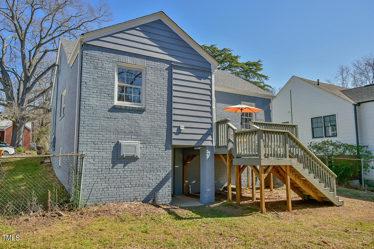 2411 Farthing Street Durham, NC 27704 - Photo 37 of 47 a view of a house with a patio