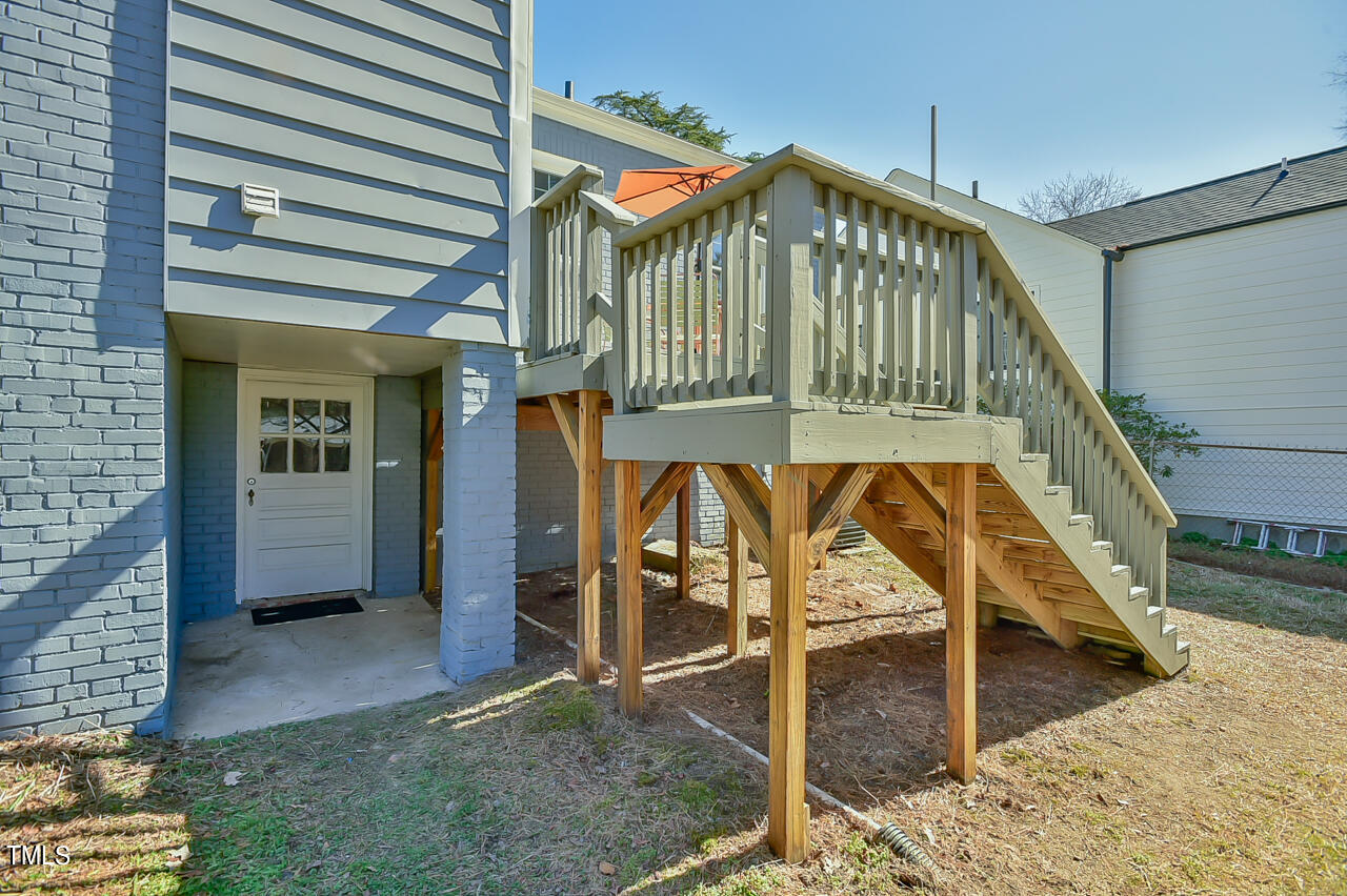 2411 Farthing Street Durham, NC 27704 - Photo 38 of 47 a view of stairs and an front door