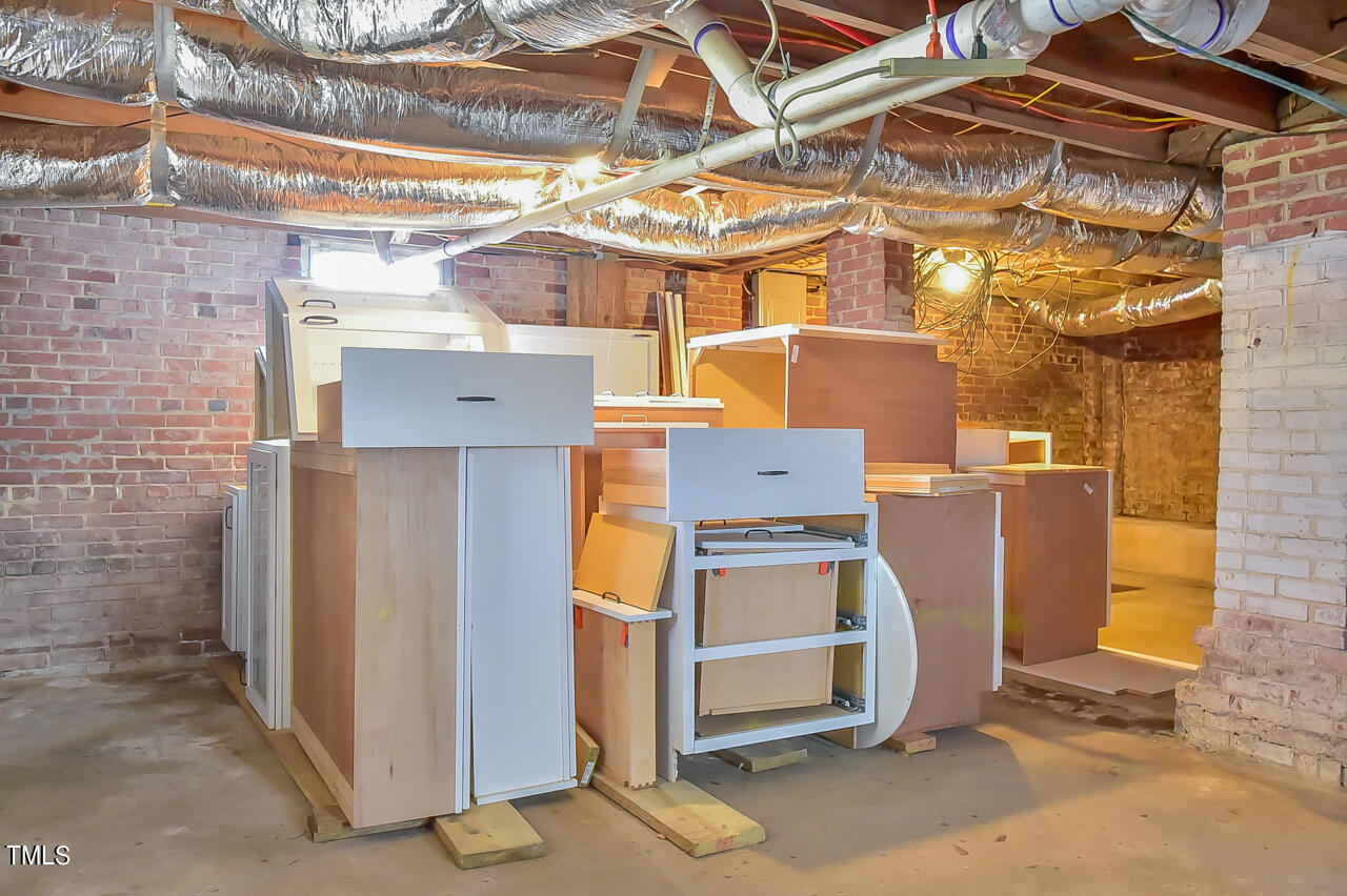 2411 Farthing Street Durham, NC 27704 - Photo 41 of 47 a utility room with dryer and washer