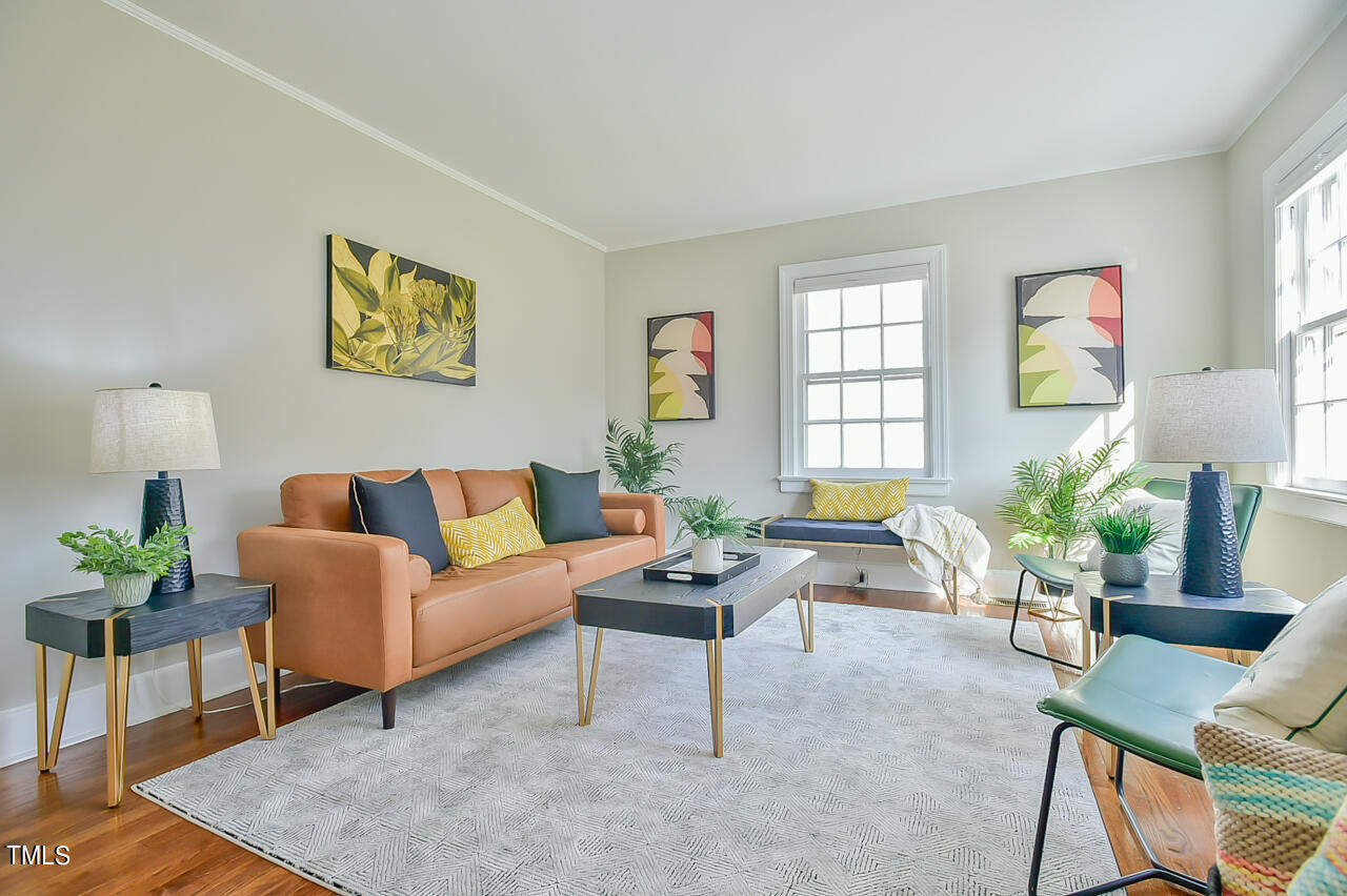 2411 Farthing Street Durham, NC 27704 - Photo 9 of 47 a living room with furniture and wooden floor